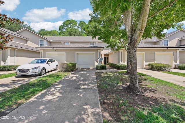 view of property featuring a garage