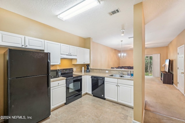 kitchen with light tile patterned flooring, black appliances, a chandelier, pendant lighting, and sink