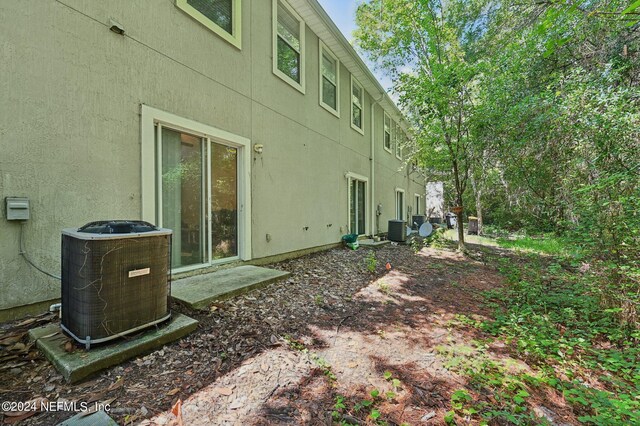 view of yard featuring central AC