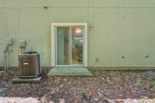 property entrance featuring central air condition unit