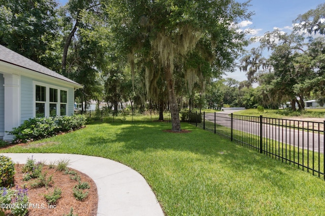 view of yard with a fenced backyard