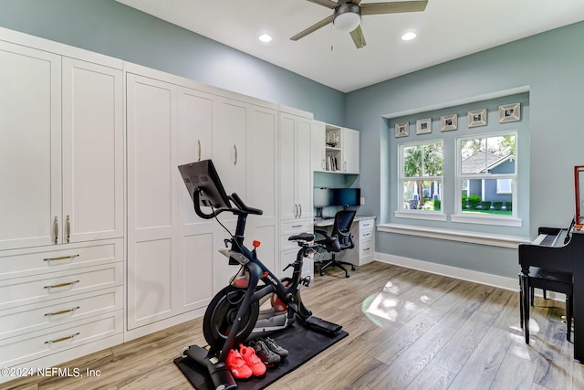 exercise area with light wood-type flooring, baseboards, a ceiling fan, and recessed lighting