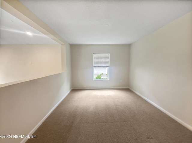 spare room with carpet flooring