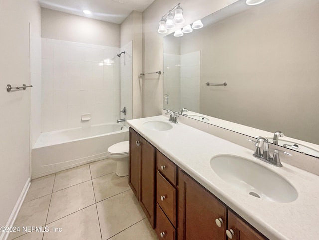 full bathroom featuring tile patterned flooring, vanity, toilet, and washtub / shower combination