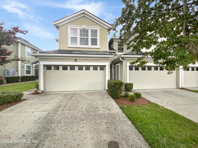 front of property featuring a garage