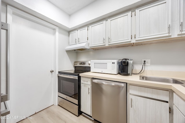 kitchen featuring light hardwood / wood-style floors and stainless steel appliances