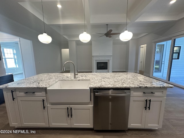 kitchen featuring white cabinetry, dishwasher, pendant lighting, and sink