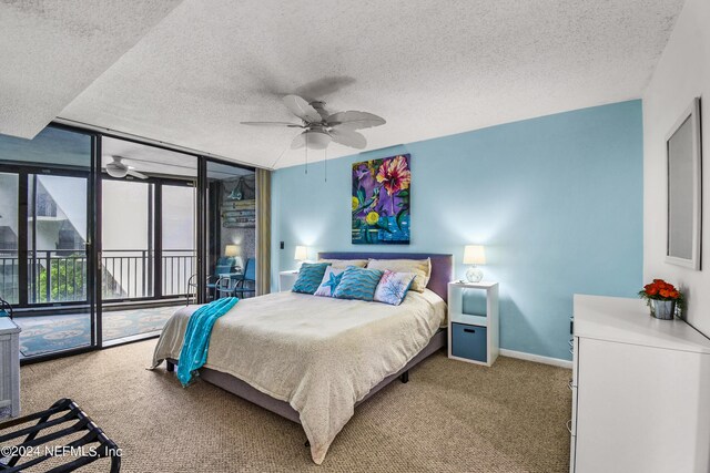 bedroom with carpet flooring, a textured ceiling, and ceiling fan