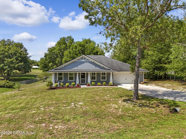 view of front of house featuring a porch and a front yard