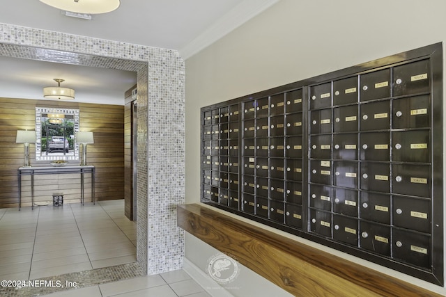 6000 San Jose Blvd Unit 11-C, Jacksonville, FL 32217 - interior space with tile patterned floors, baseboards, wood walls, and mail area