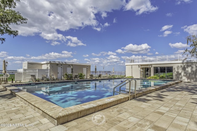 6000 San Jose Blvd Unit 11-C, Jacksonville, FL 32217 - pool featuring fence and a patio