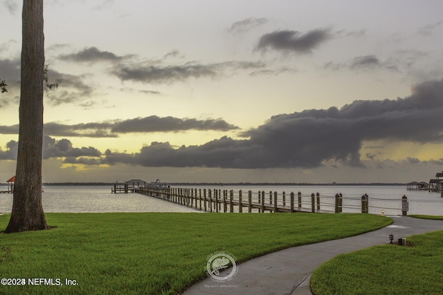 6000 San Jose Blvd Unit 11-C, Jacksonville, FL 32217 - view of dock with a lawn and a water view