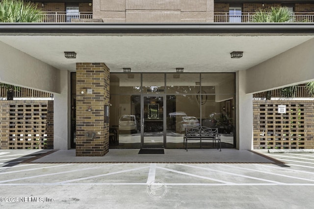 6000 San Jose Blvd Unit 11-C, Jacksonville, FL 32217 - entrance to property with brick siding and a patio area