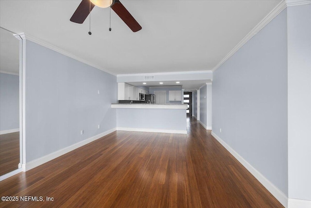 6000 San Jose Blvd Unit 11-C, Jacksonville, FL 32217 - unfurnished living room with baseboards, ceiling fan, dark wood-style floors, and ornamental molding
