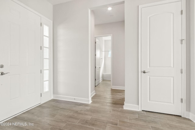 85425 Sandy Ridge Loop Unit 0085, Yulee, FL 32097 - entryway with baseboards and wood finish floors