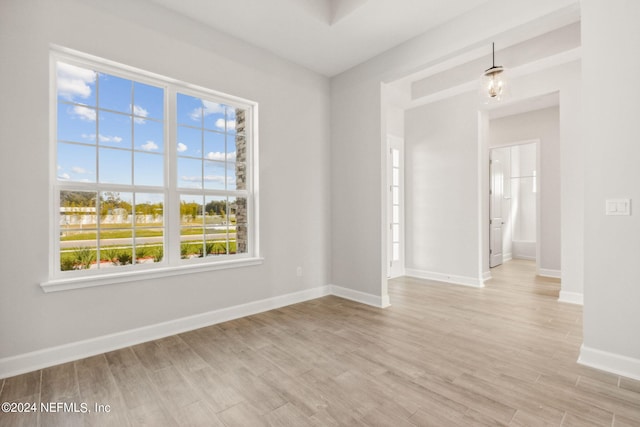 85425 Sandy Ridge Loop Unit 0085, Yulee, FL 32097 - spare room with light wood-type flooring and baseboards