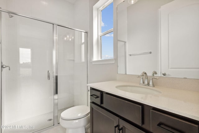 85425 Sandy Ridge Loop Unit 0085, Yulee, FL 32097 - bathroom with toilet, a shower stall, and vanity