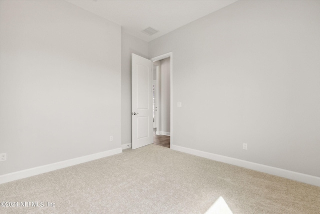 85425 Sandy Ridge Loop Unit 0085, Yulee, FL 32097 - unfurnished room with carpet flooring, visible vents, and baseboards