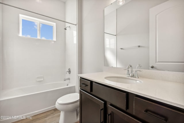 85425 Sandy Ridge Loop Unit 0085, Yulee, FL 32097 - bathroom featuring toilet, tub / shower combination, wood finished floors, and vanity