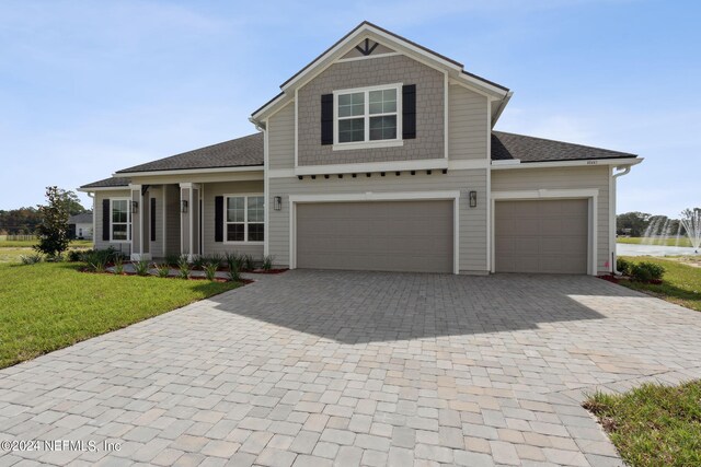 view of property with a front lawn