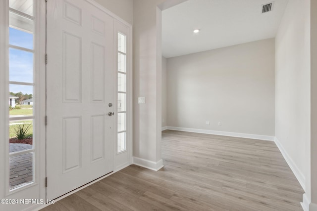 entrance foyer with light hardwood / wood-style floors