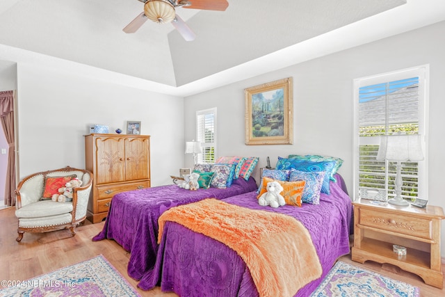 bedroom with ceiling fan and hardwood / wood-style flooring