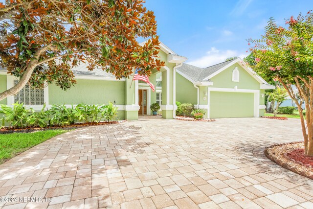 view of front of house with a garage