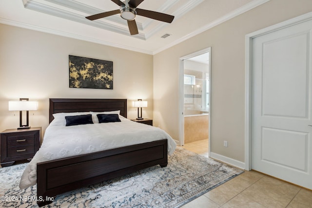 tiled bedroom with ceiling fan, crown molding, connected bathroom, and a tray ceiling