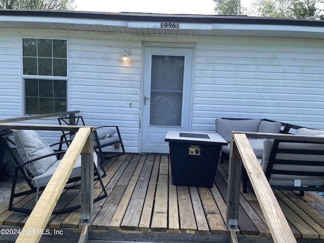 deck with an outdoor living space