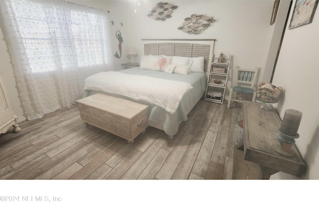 bedroom featuring light hardwood / wood-style floors