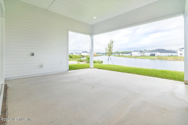 view of patio featuring a water view