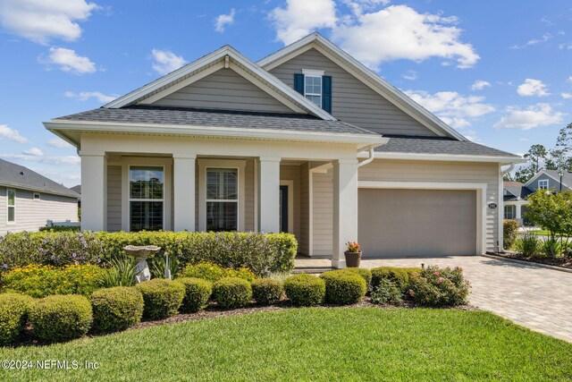 view of front of home with a front lawn