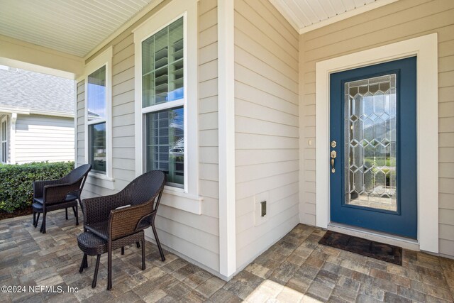 property entrance with a porch