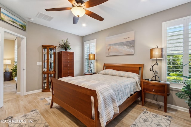 bedroom featuring ceiling fan and light hardwood / wood-style flooring