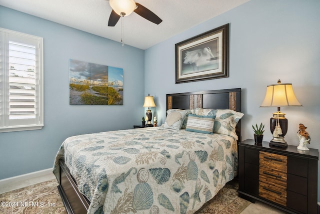 bedroom featuring ceiling fan