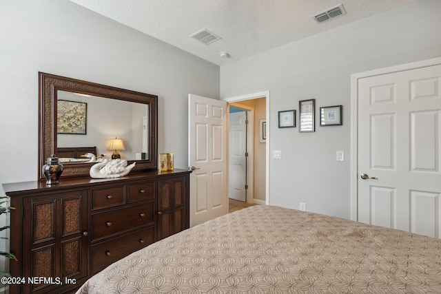 bedroom with a textured ceiling