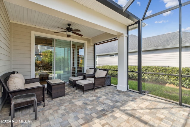 sunroom / solarium with ceiling fan