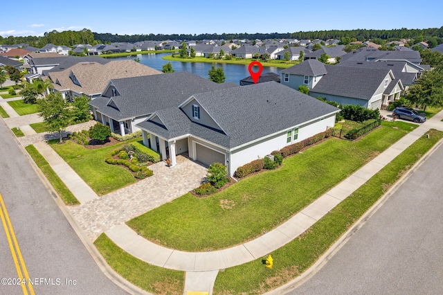 drone / aerial view with a water view