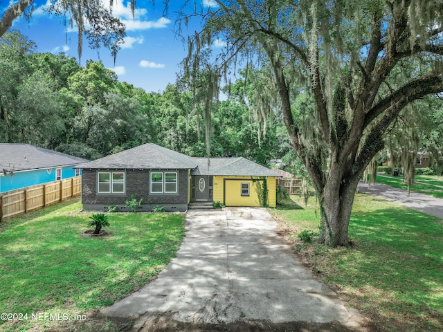 ranch-style house with a front lawn