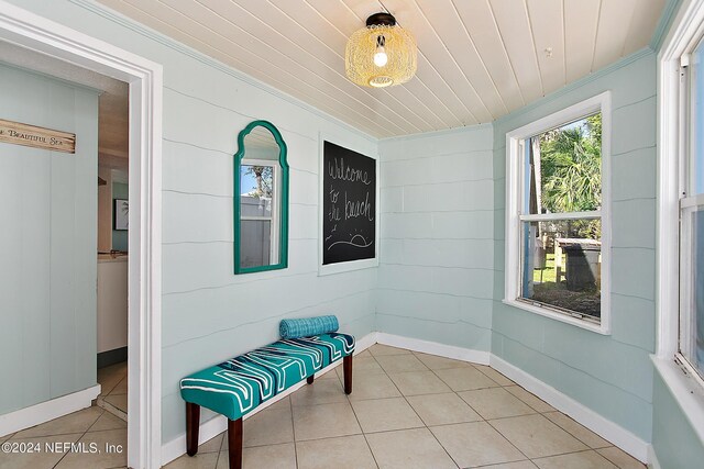 sunroom / solarium with wooden ceiling