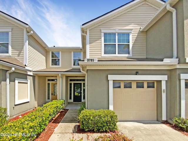 view of front of home with a garage