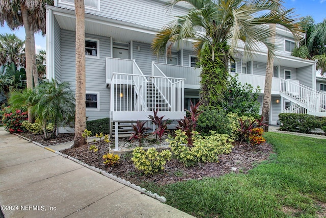 view of front of home featuring stairs