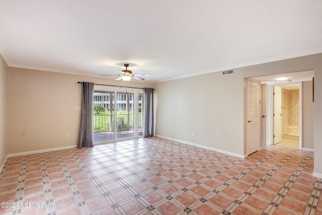 unfurnished room featuring baseboards, visible vents, ceiling fan, and crown molding