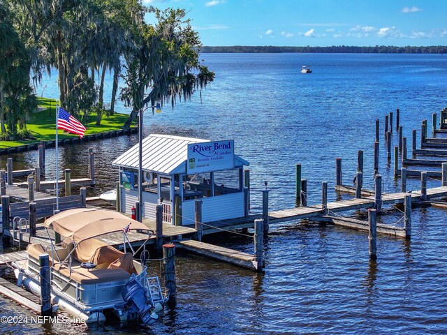 view of dock with a water view