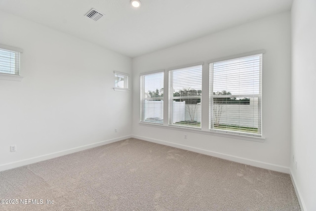 view of carpeted spare room