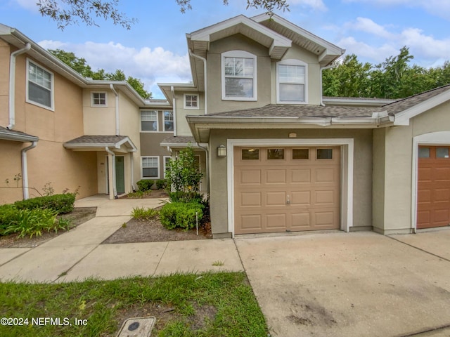 view of front of home with a garage