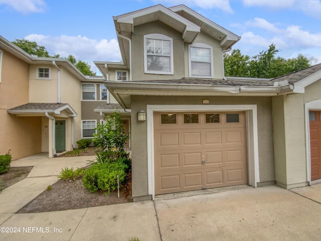 view of front of property with a garage