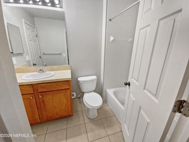 full bathroom with shower / bathtub combination, tile patterned floors, toilet, and vanity