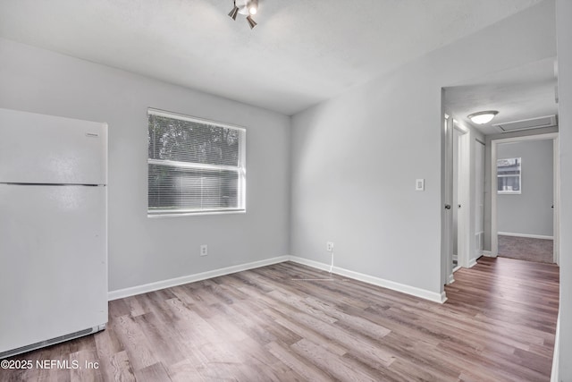 empty room featuring light hardwood / wood-style floors