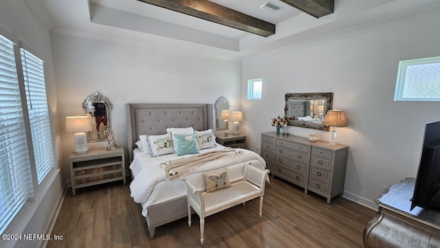 bedroom with beam ceiling, dark hardwood / wood-style flooring, ornamental molding, and multiple windows